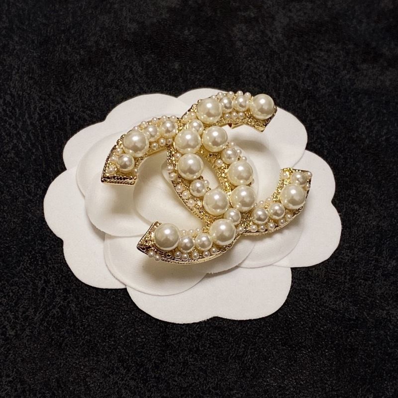 Ch*el brooches
